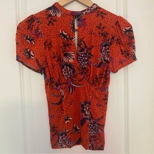Free People Key Hole "Hear Me Roar" Orange and Red Top Size XS